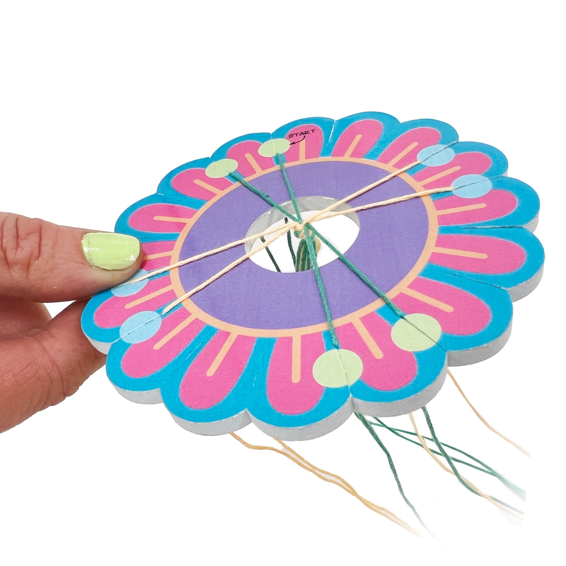 Bracelet weaving tool used to create colourful friendship bracelet patterns