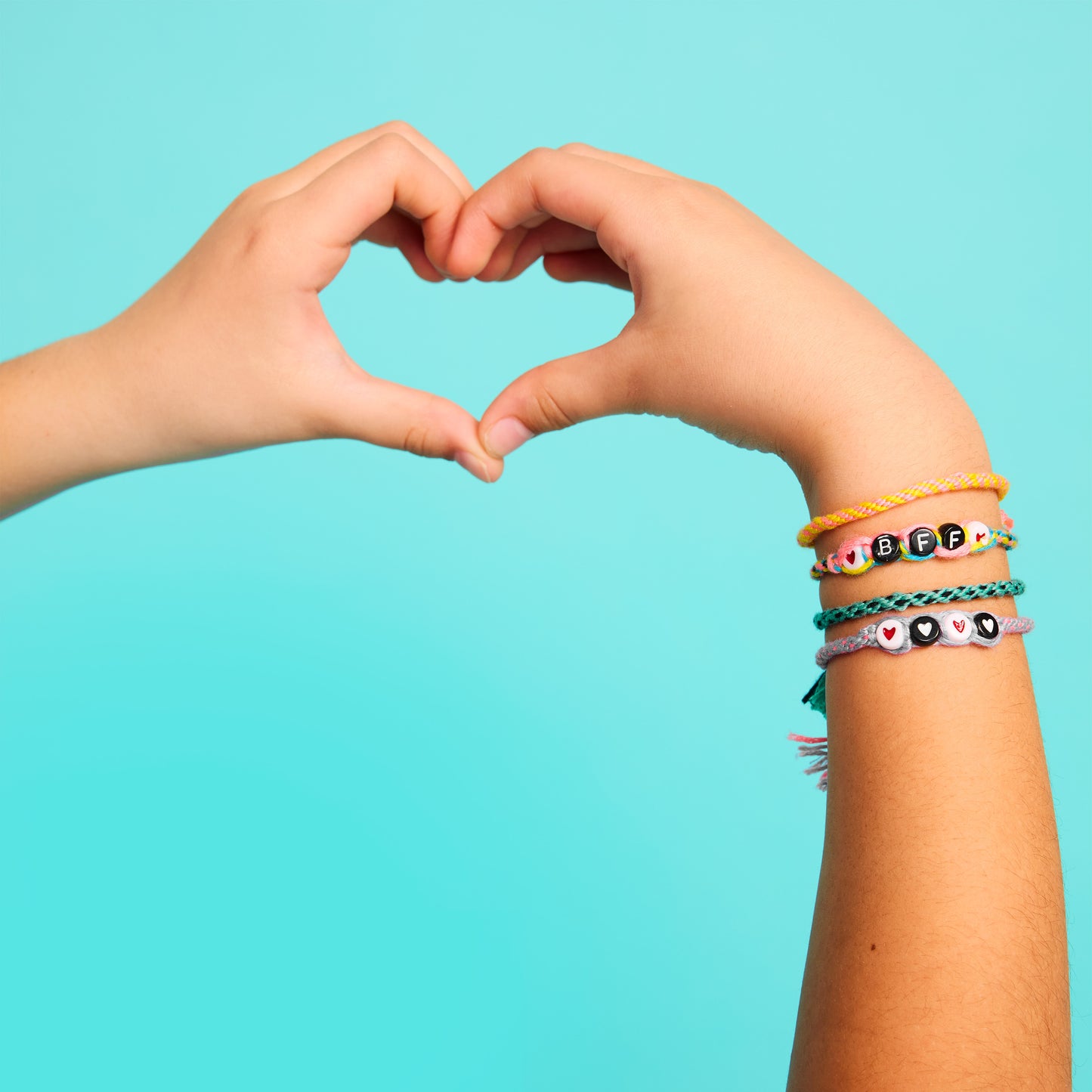 Colourful handmade friendship bracelets designed to wear, stack and share