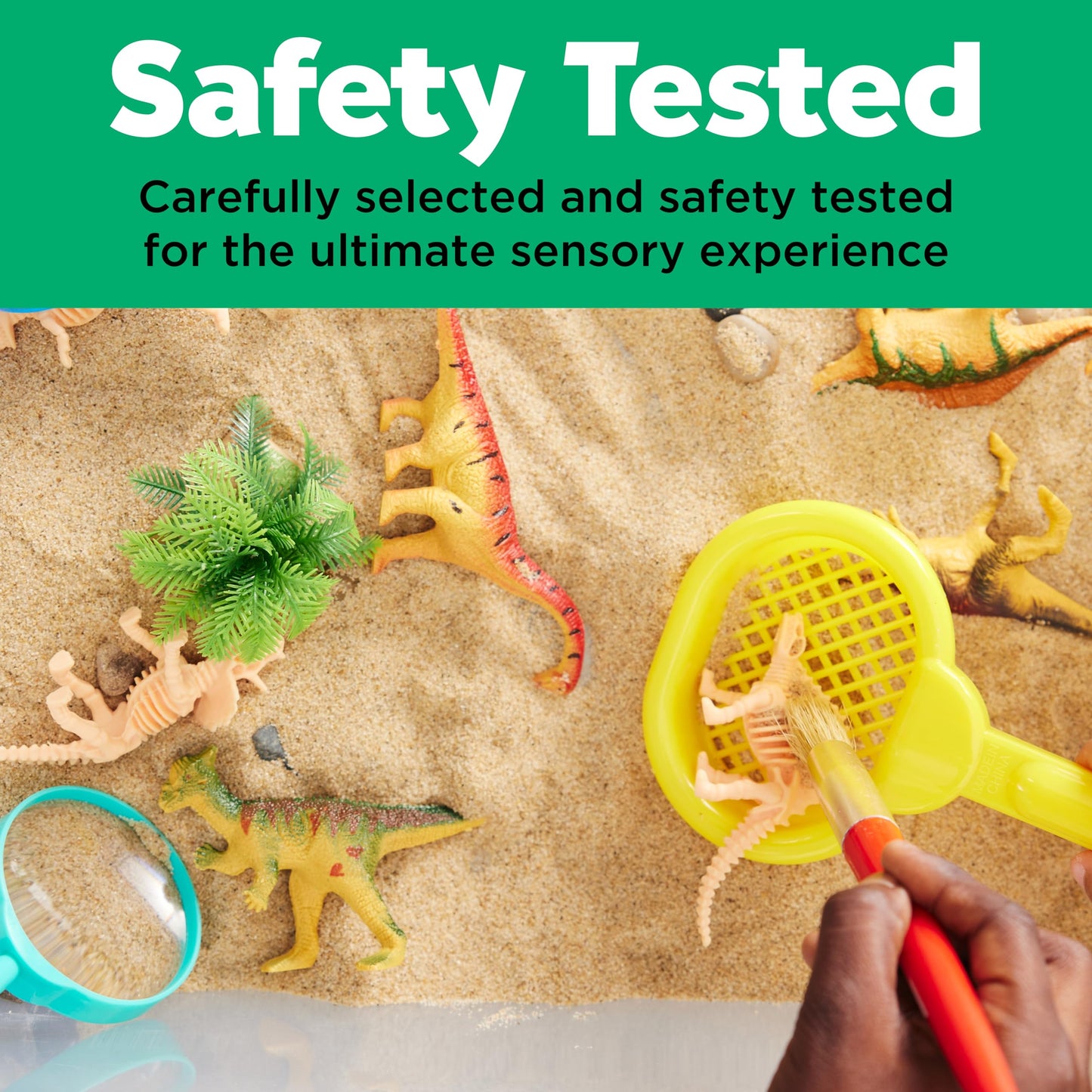 Safety-tested Dinosaur Sensory Bin with play sand, dinosaur figures and sensory play tools