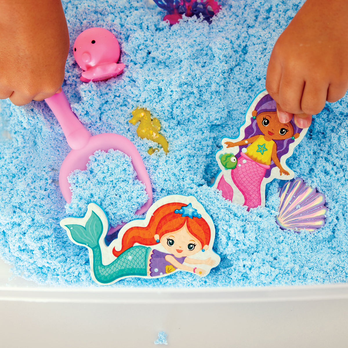 Hands-on Mermaid Sensory Bin play with colourful underwater characters and sensory materials