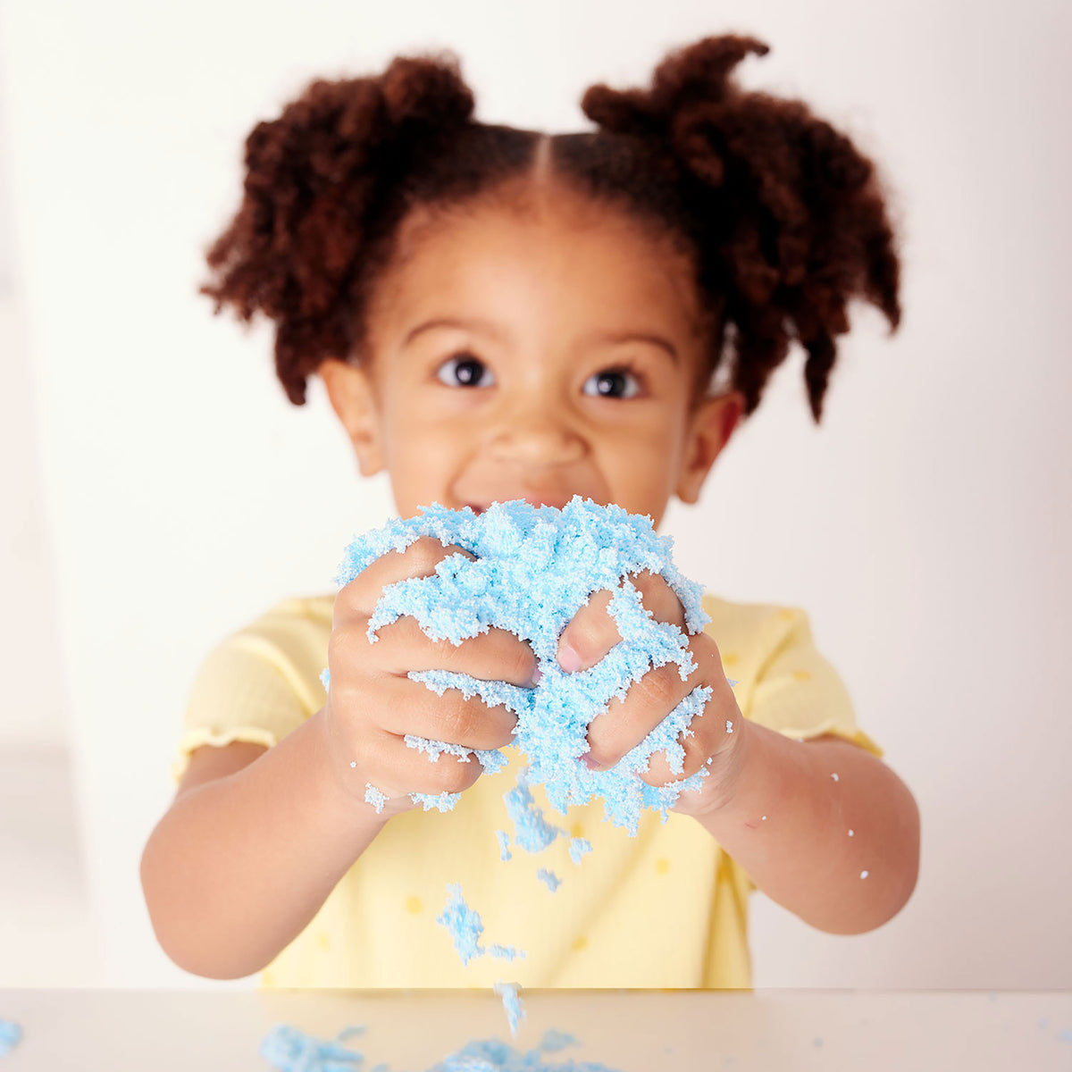 Child enjoying mermaid sensory play for ages 3 and over